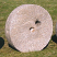 Old stone millstone